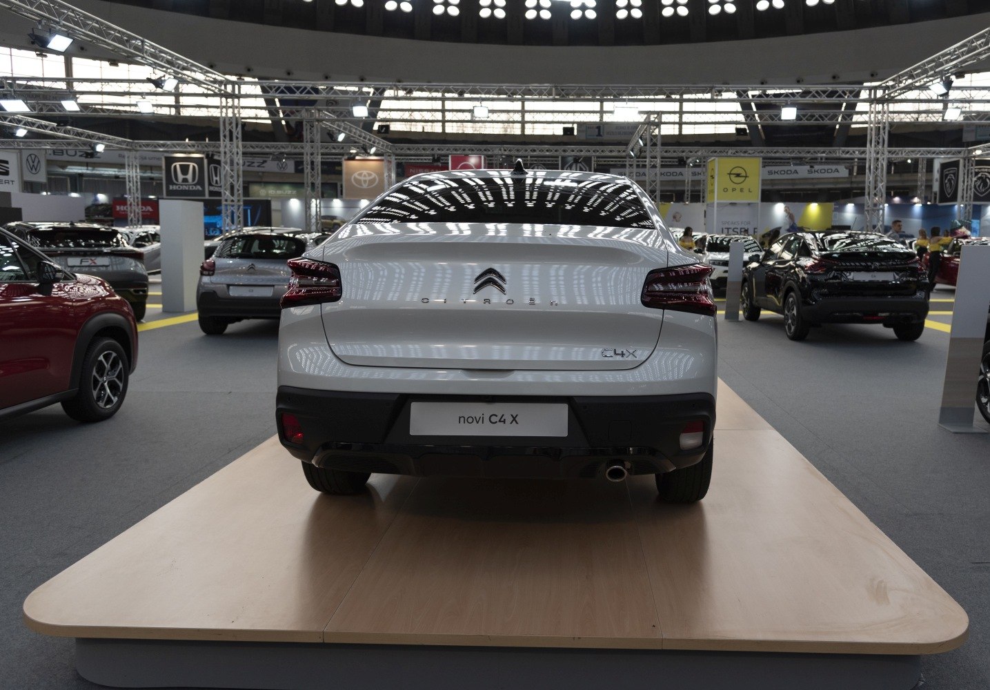 Rear view of vehicle with distinct taillights and diffuser exhaust
