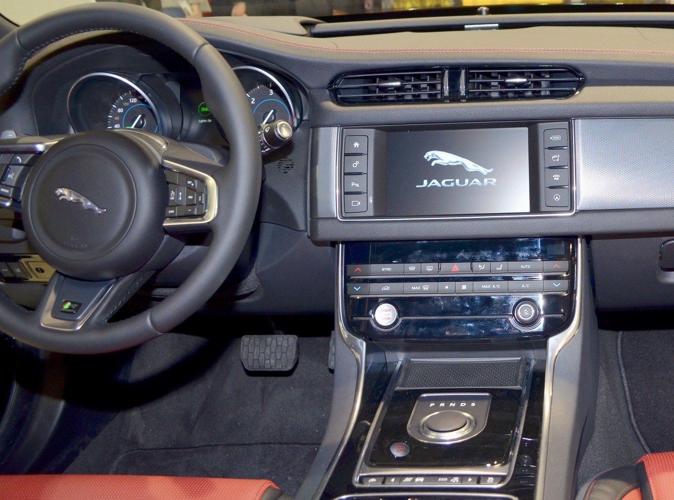 Dashboard with touchscreen and rotary gear selector
