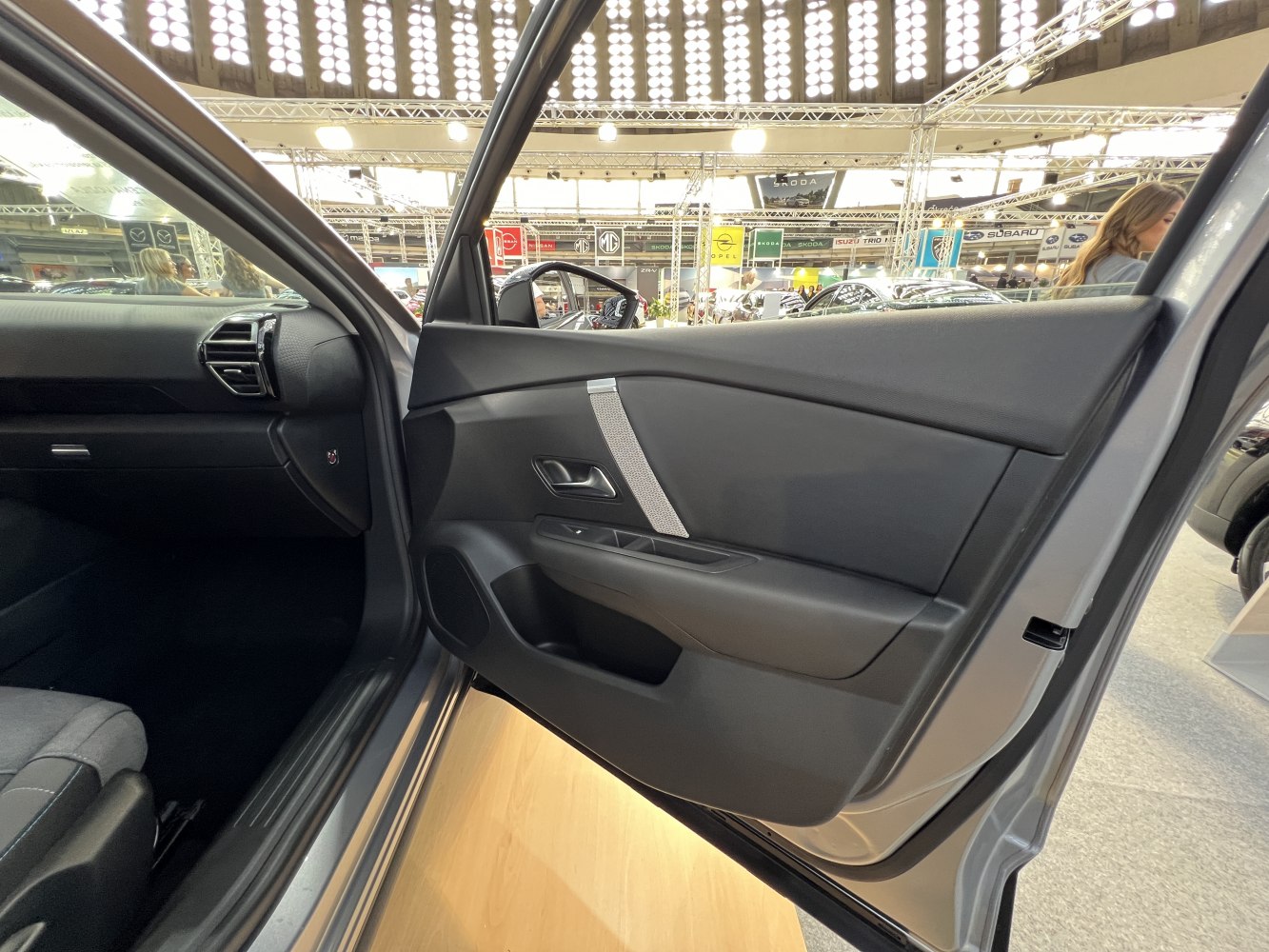 Interior door panel with modern handle and storage compartment