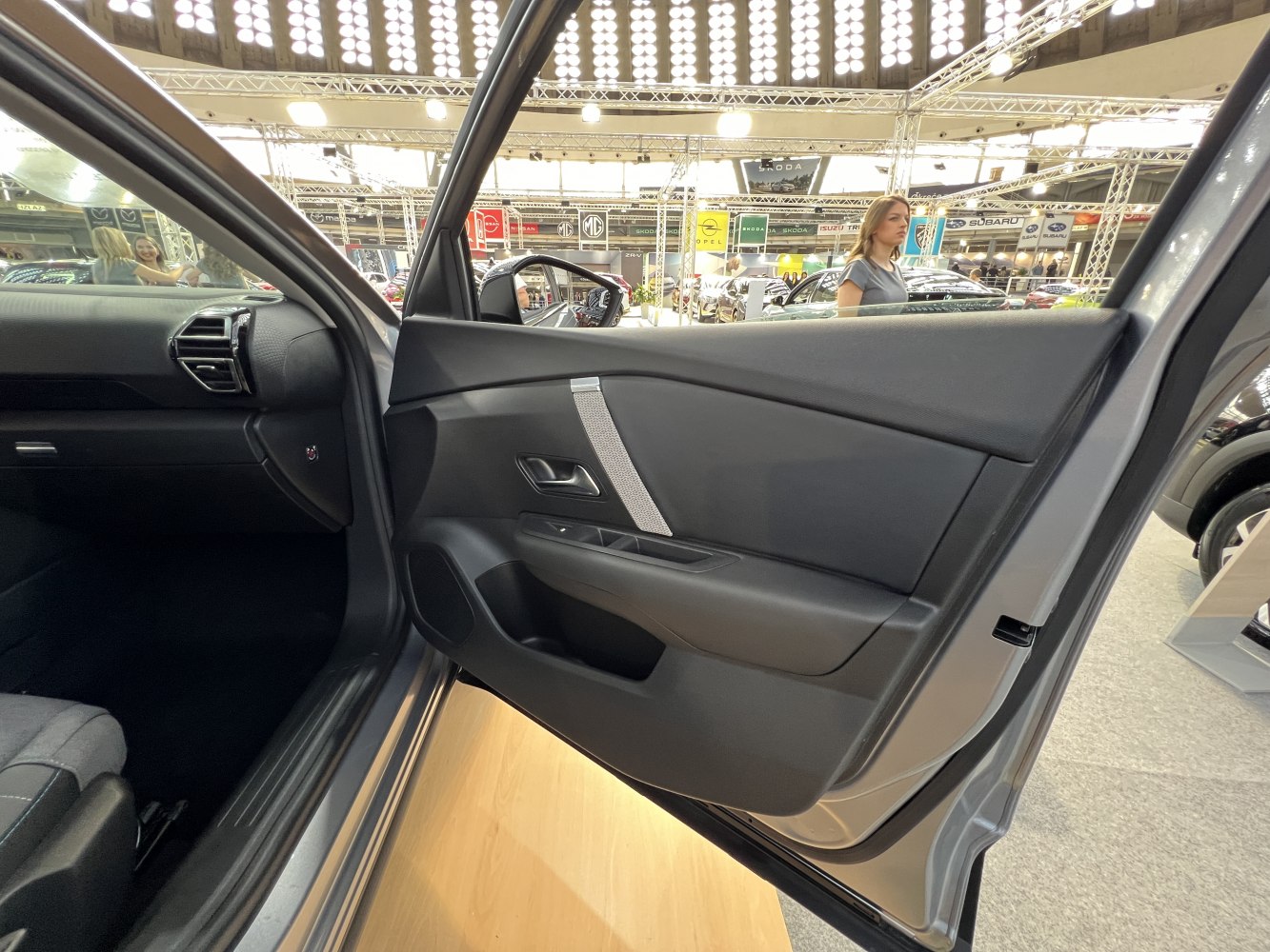 Modern interior door panel with sleek design and functional compartments