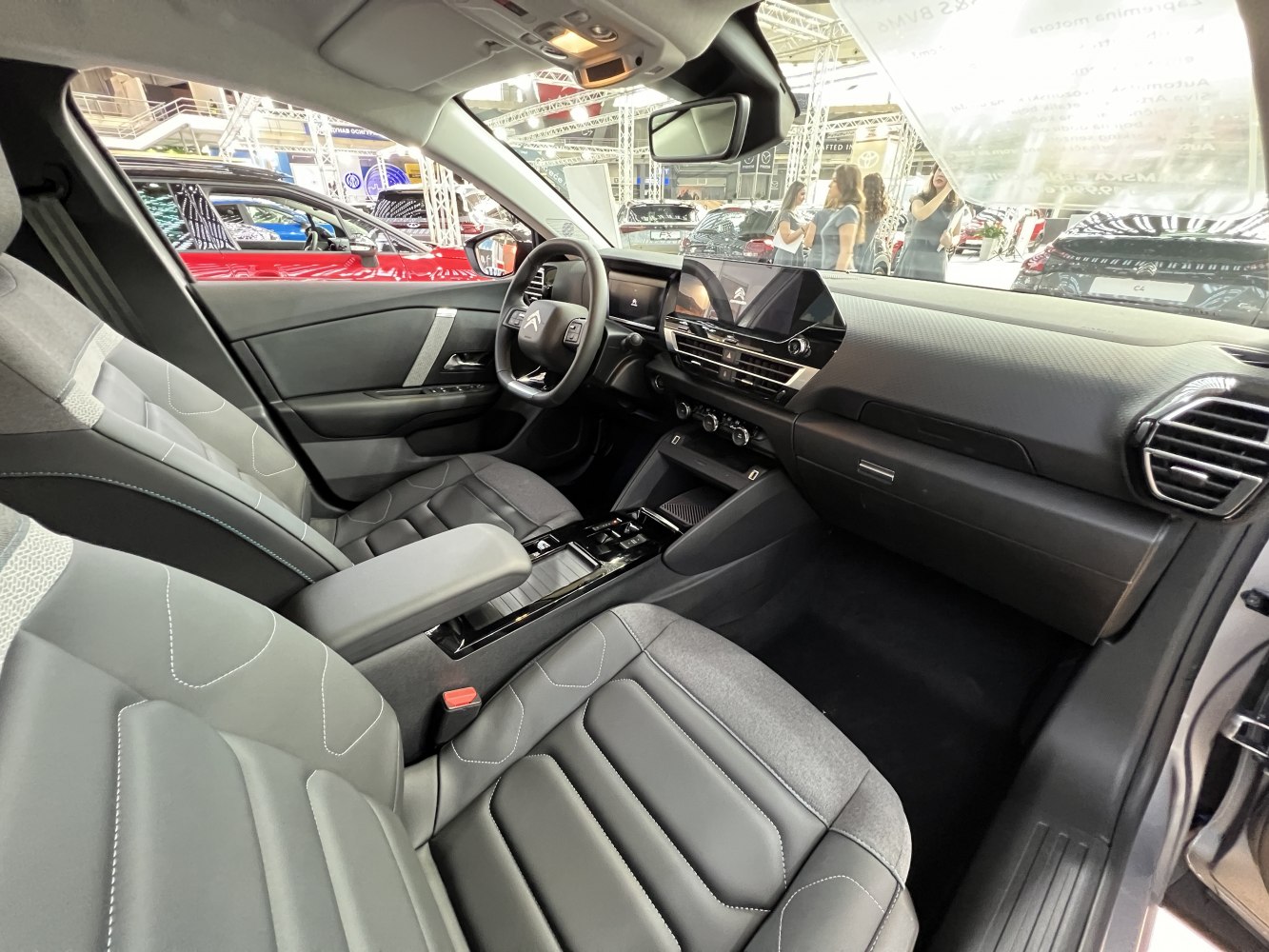 Modern dashboard layout and comfortable front seating upholstery.