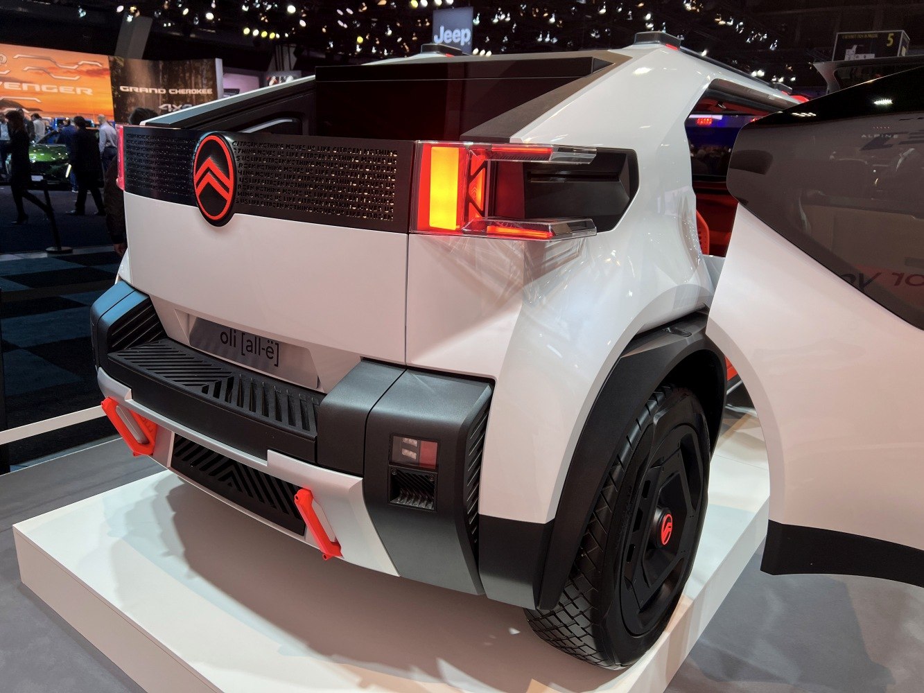Futuristic rear design with distinctive tail lights and bold bumper styling.