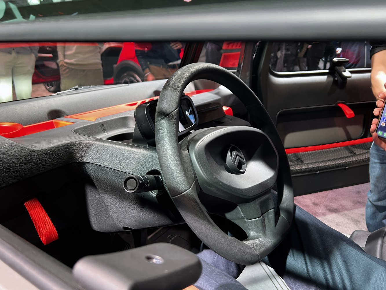 Minimalistic interior with compact steering wheel and dashboard