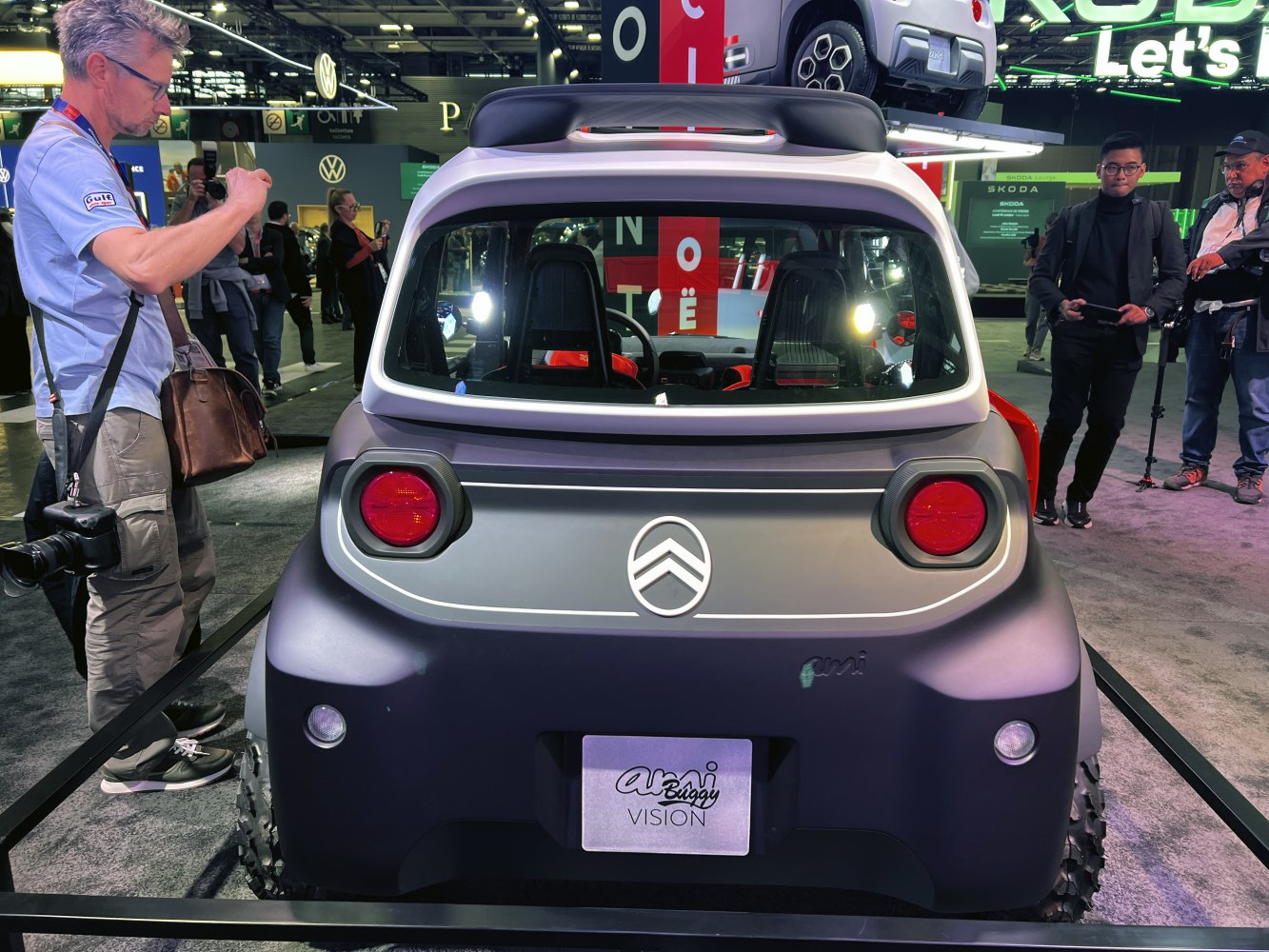 Rear view of electric buggy with distinctive round taillights and off-road tires