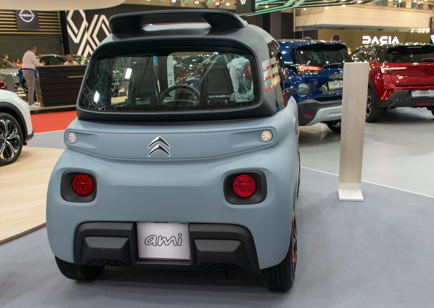 Compact rear view with round taillights and large rear window