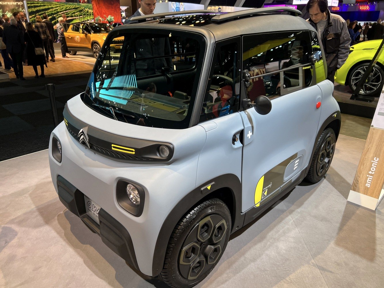 Dual-level headlights and hexagonal wheels on compact electric vehicle
