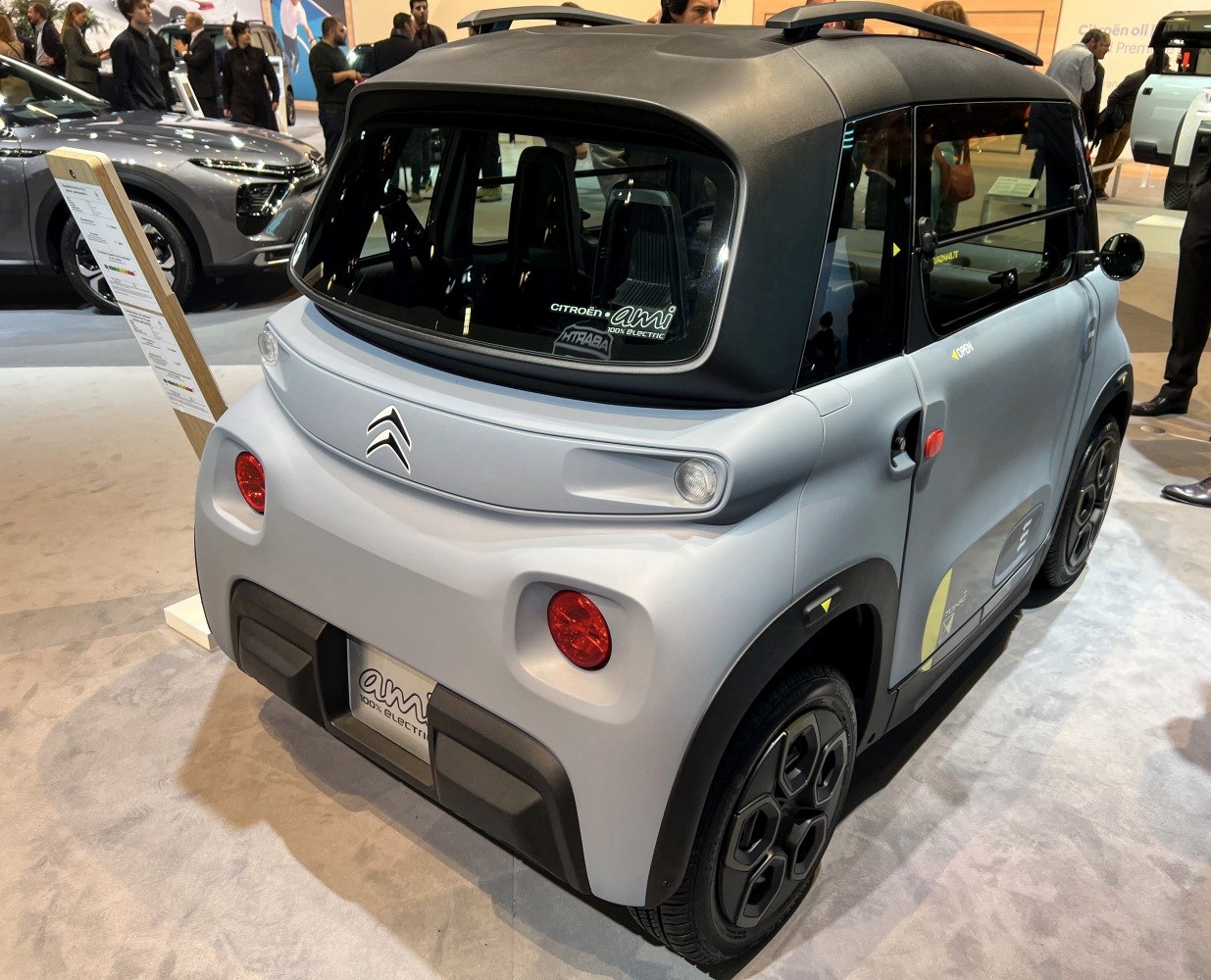 Compact electric vehicle rear and side, unique door and light design