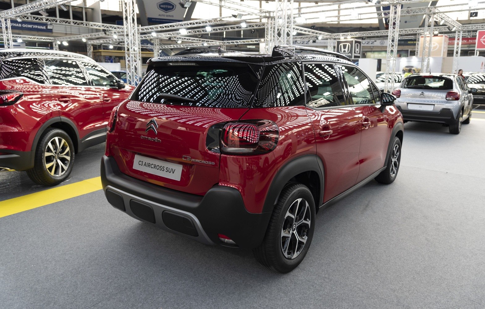 Rear view of a compact SUV with two-tone body and distinctive taillights