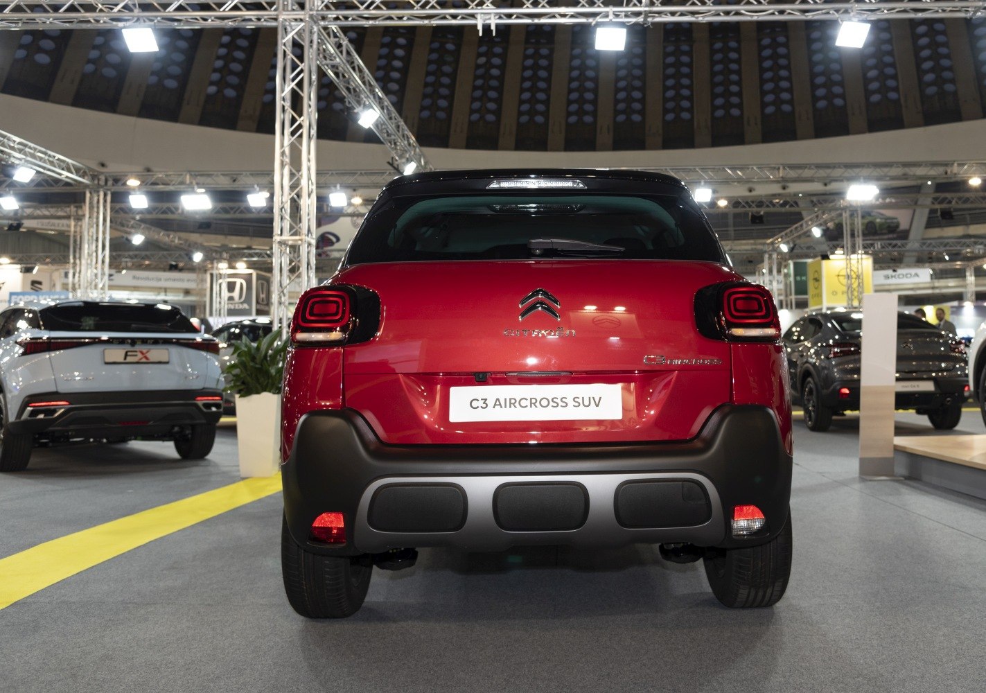 Rear view with distinctive taillights and bumper design