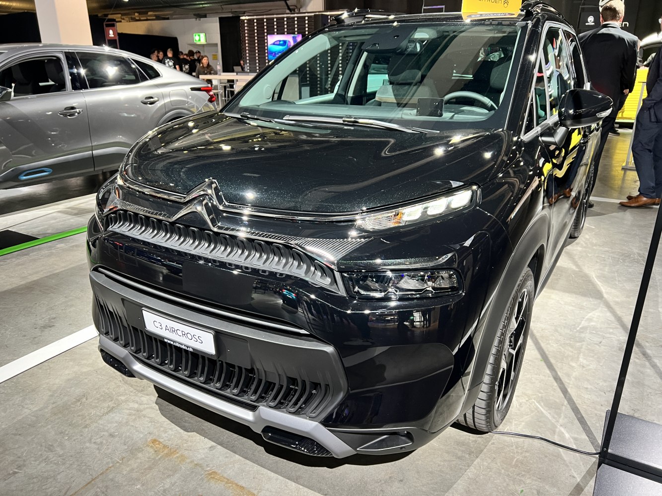 Modern front design with distinctive headlights and grille