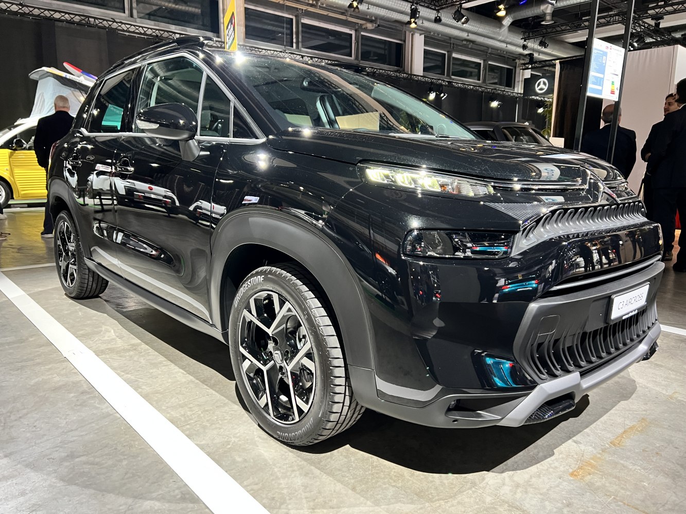 Front and side view with LED headlights and alloy wheels