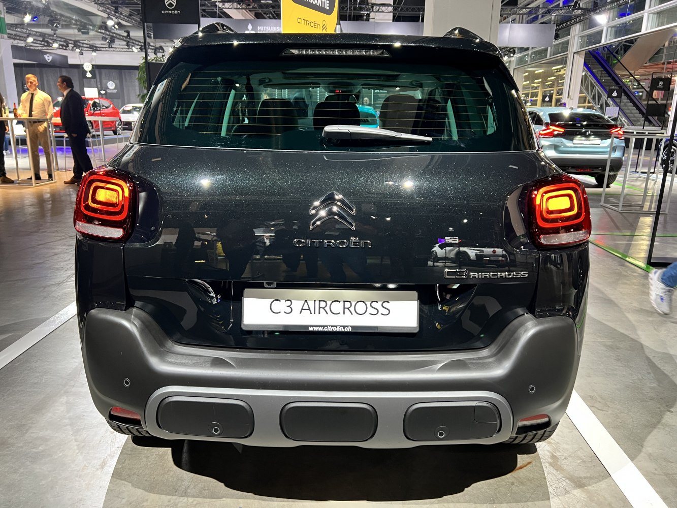 Rear view of compact SUV with distinctive tail lights and bumper design
