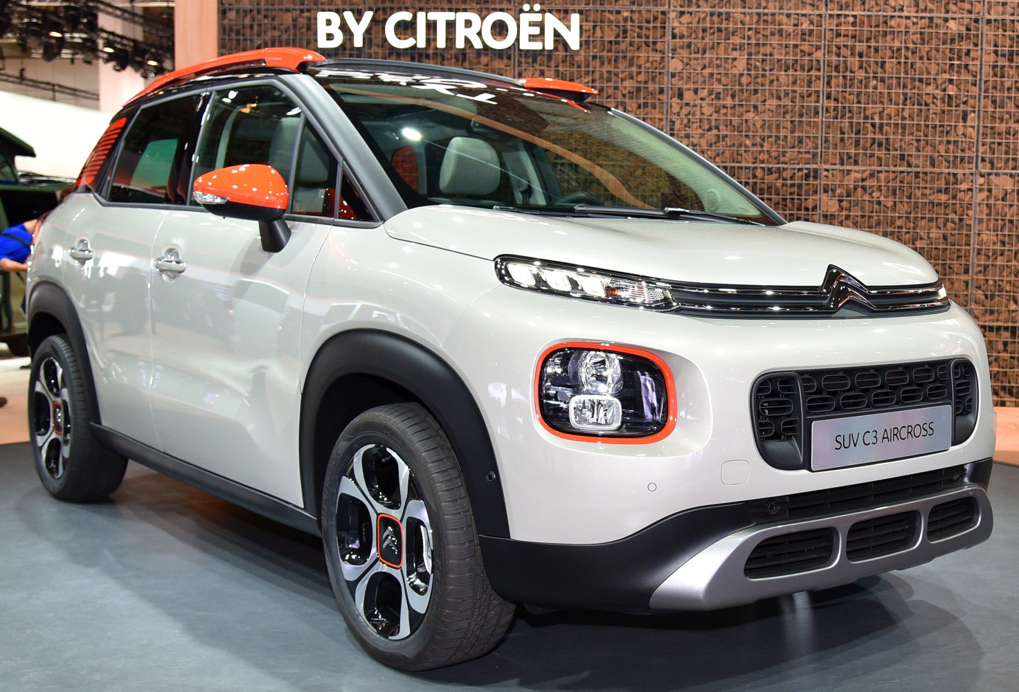Compact SUV front view with dual headlights and contrasting accents