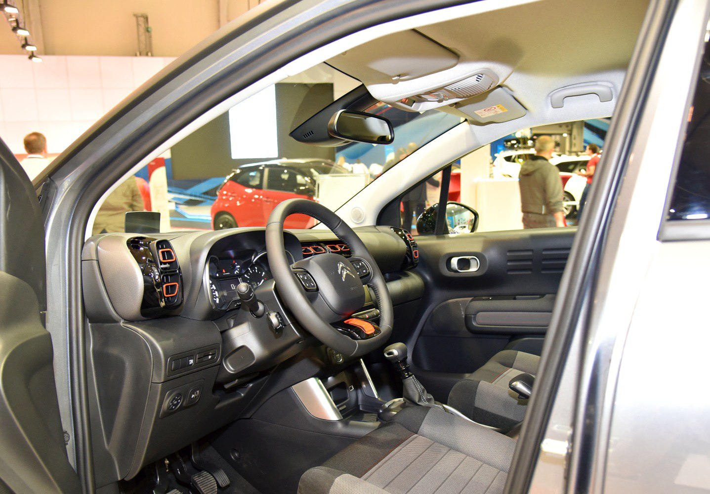 Dashboard and steering wheel with front seats interior view