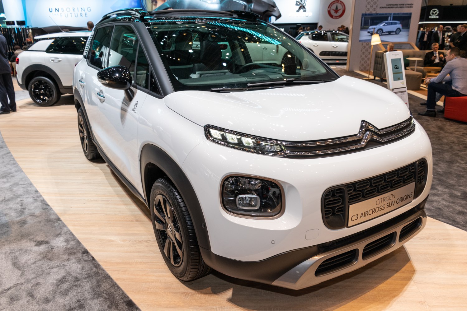 Front view with distinctive LED headlights and modern SUV styling