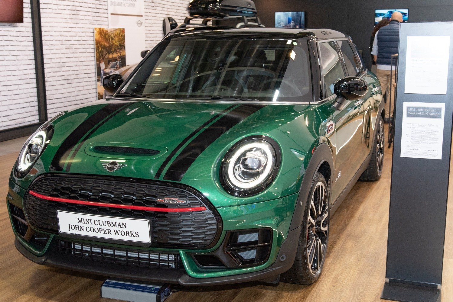 Sporty front view with racing stripes and circular LED headlights
