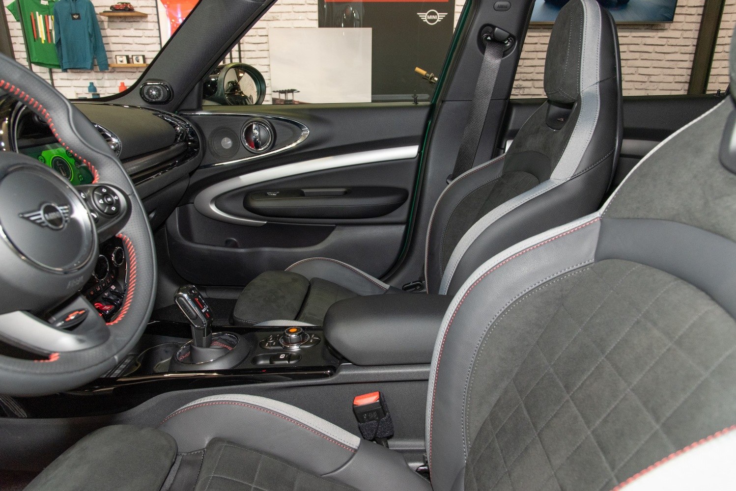 Sport seats and modern interior cabin design with steering wheel and gear shifter