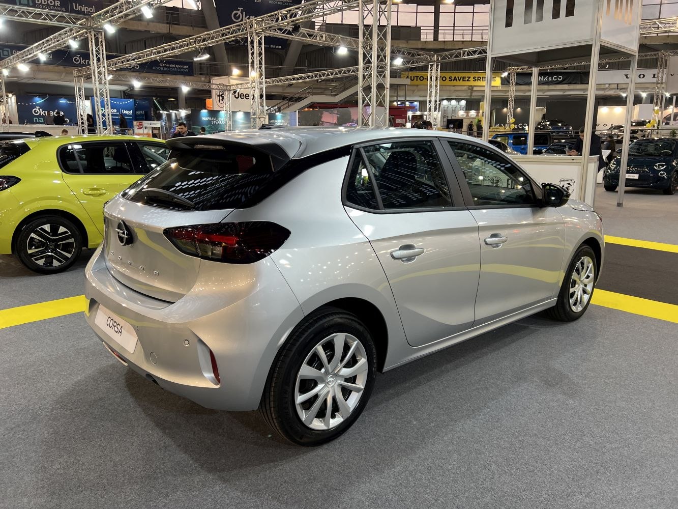 Rear three-quarter view of silver modern hatchback with updated styling