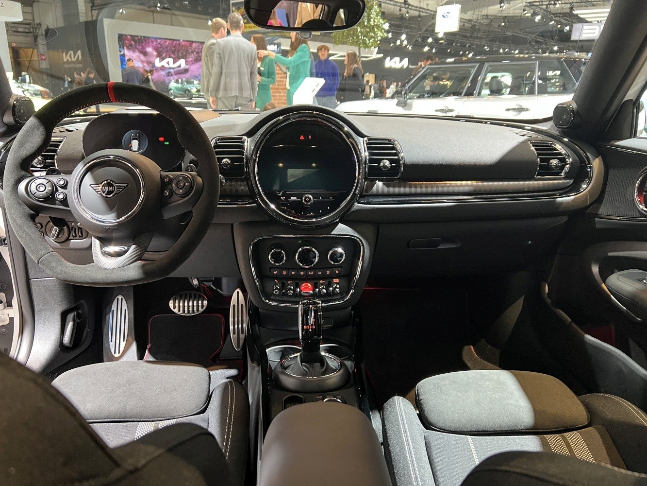 Modern car interior with digital displays and unique steering wheel