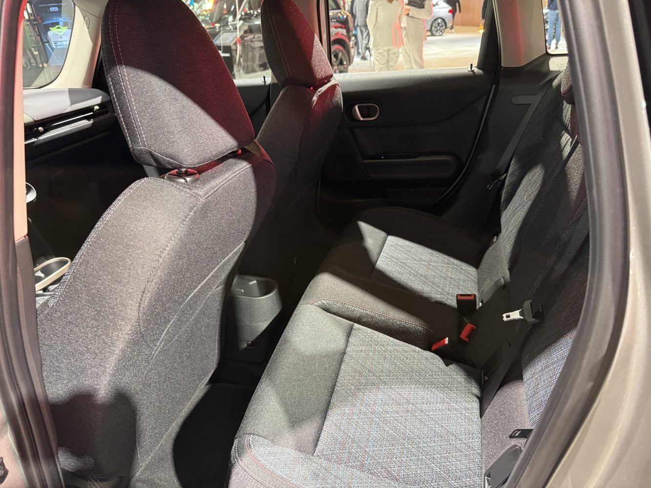 Rear passenger seating with fabric upholstery and spacious layout