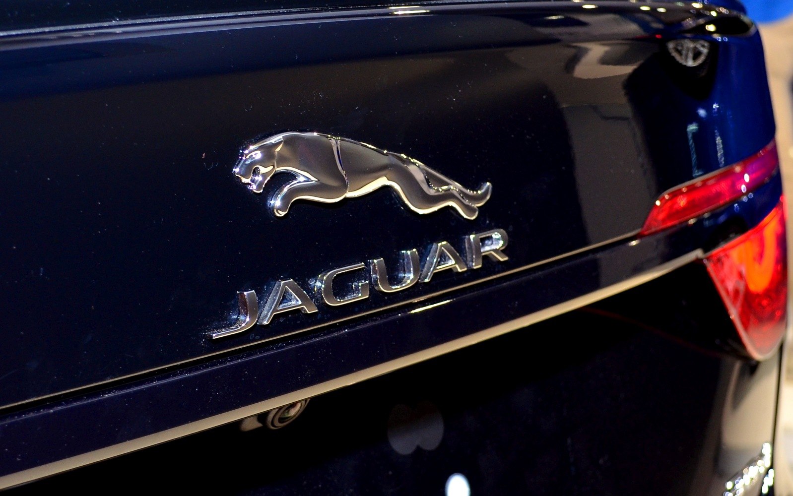 Close-up of Jaguar XF rear badge and emblem with rear light detail