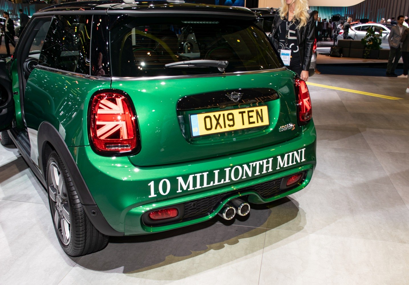 Green Mini Hatch rear with Union Jack taillights and dual exhaust pipes