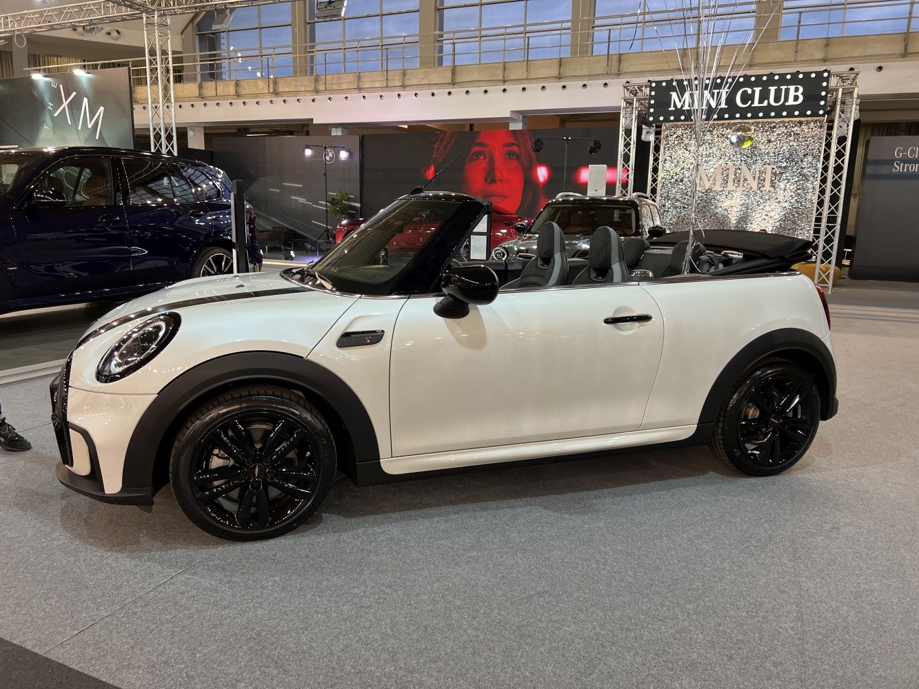 Open-top compact convertible with black rims and modern design