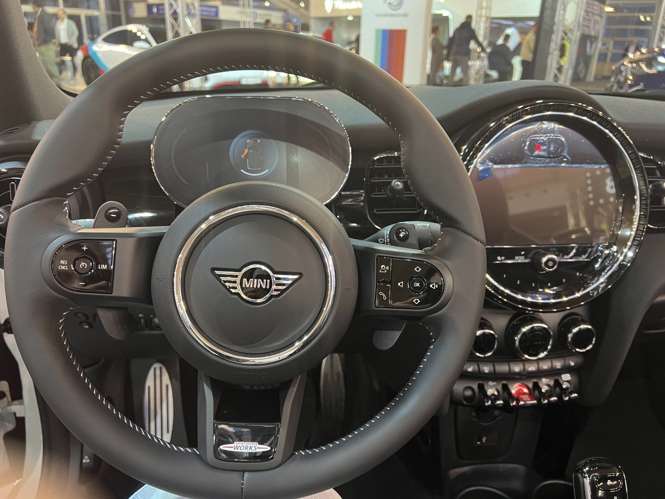 Modern steering wheel with controls and circular dashboard display