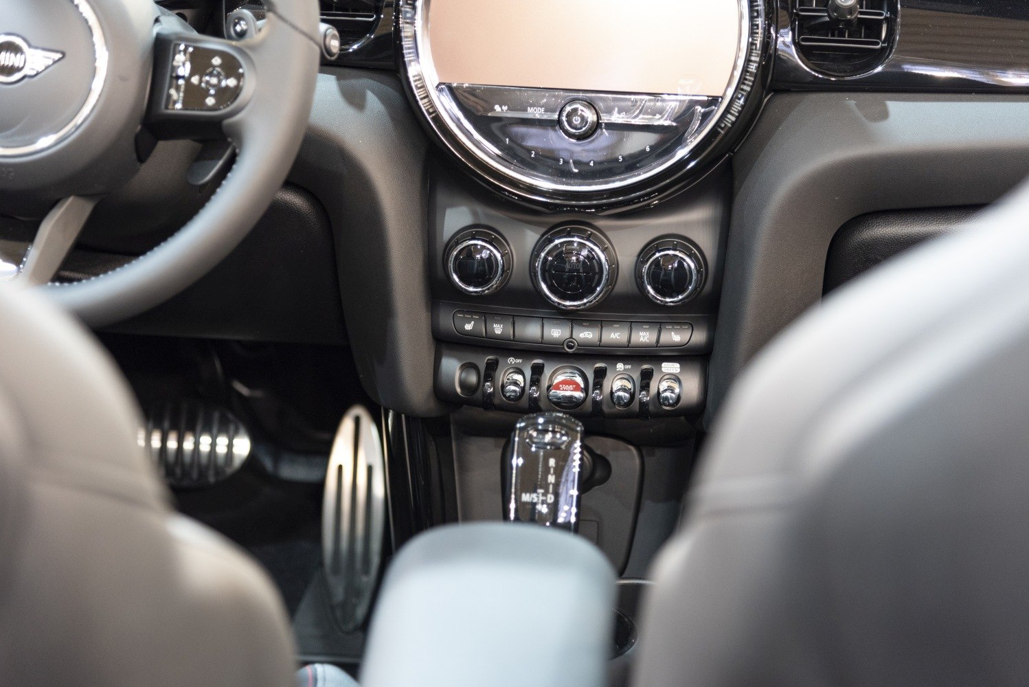 Center console with climate control dials and gear selector