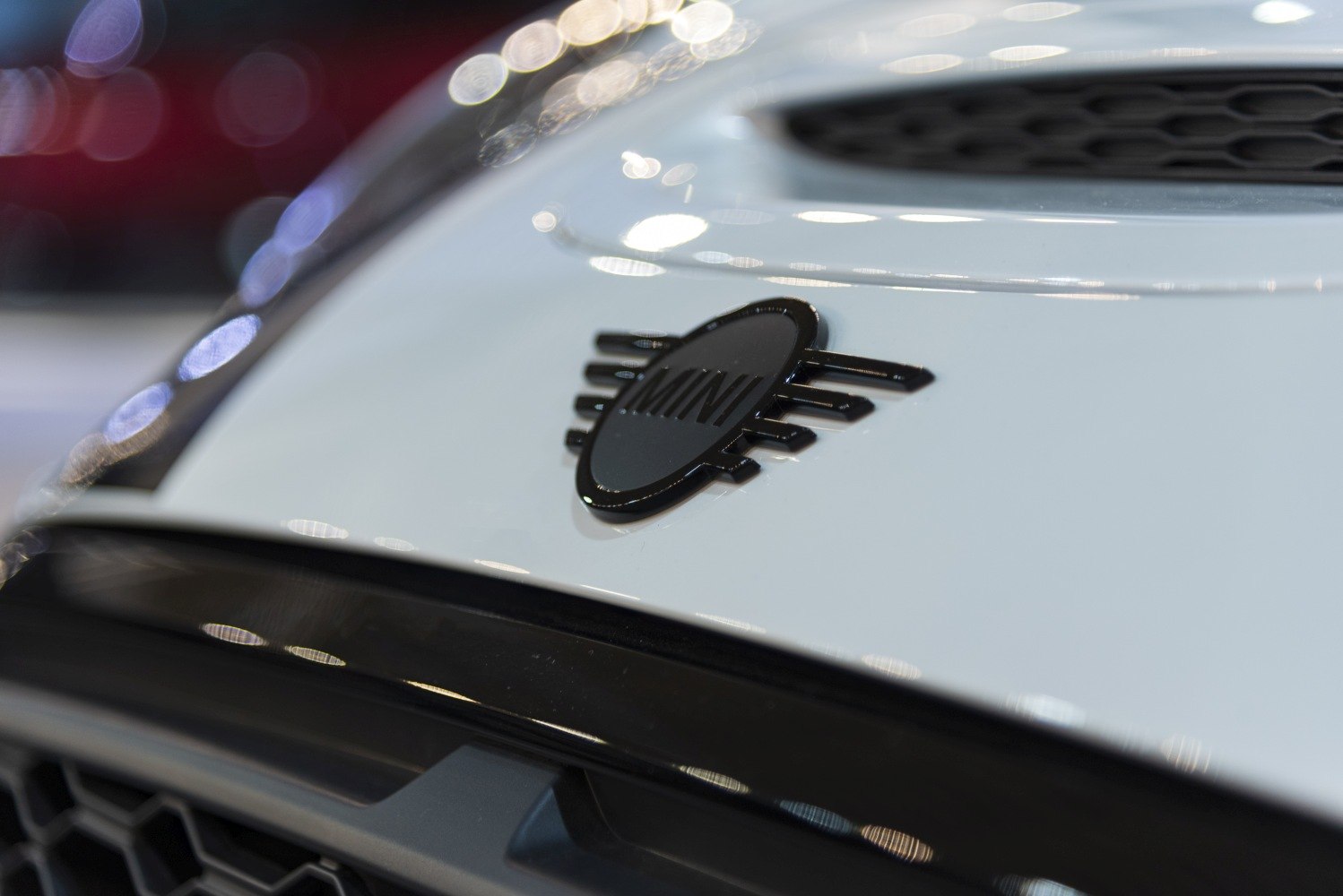Black badge front emblem close-up on car hood