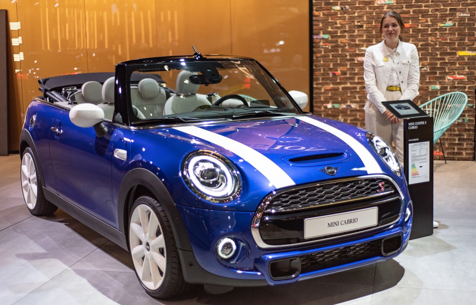 Blue convertible with white stripes and LED headlights