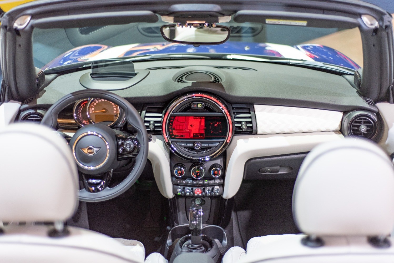 Dashboard with steering wheel, digital infotainment, and automatic transmission