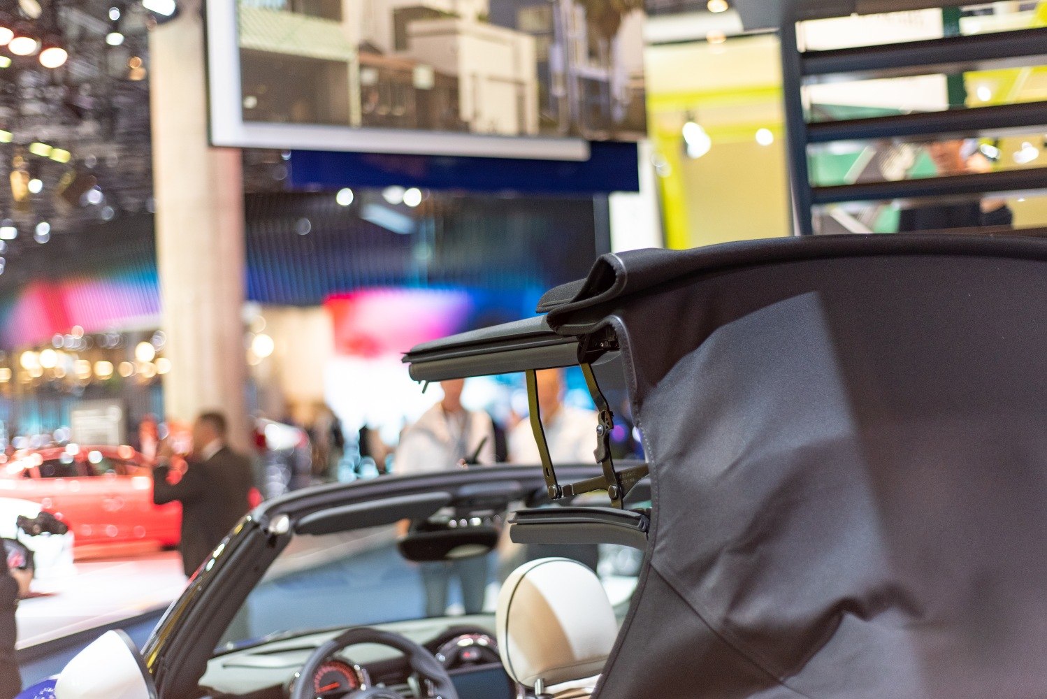 Soft top folding mechanism of a convertible car