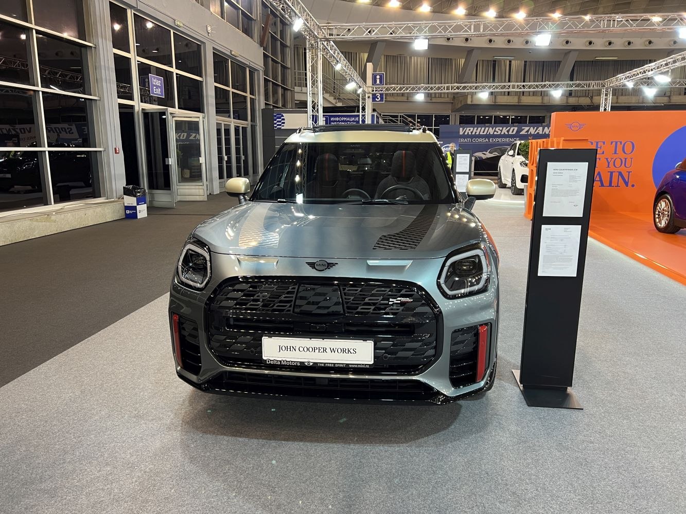 Aggressive front grill and headlights of a compact SUV on display