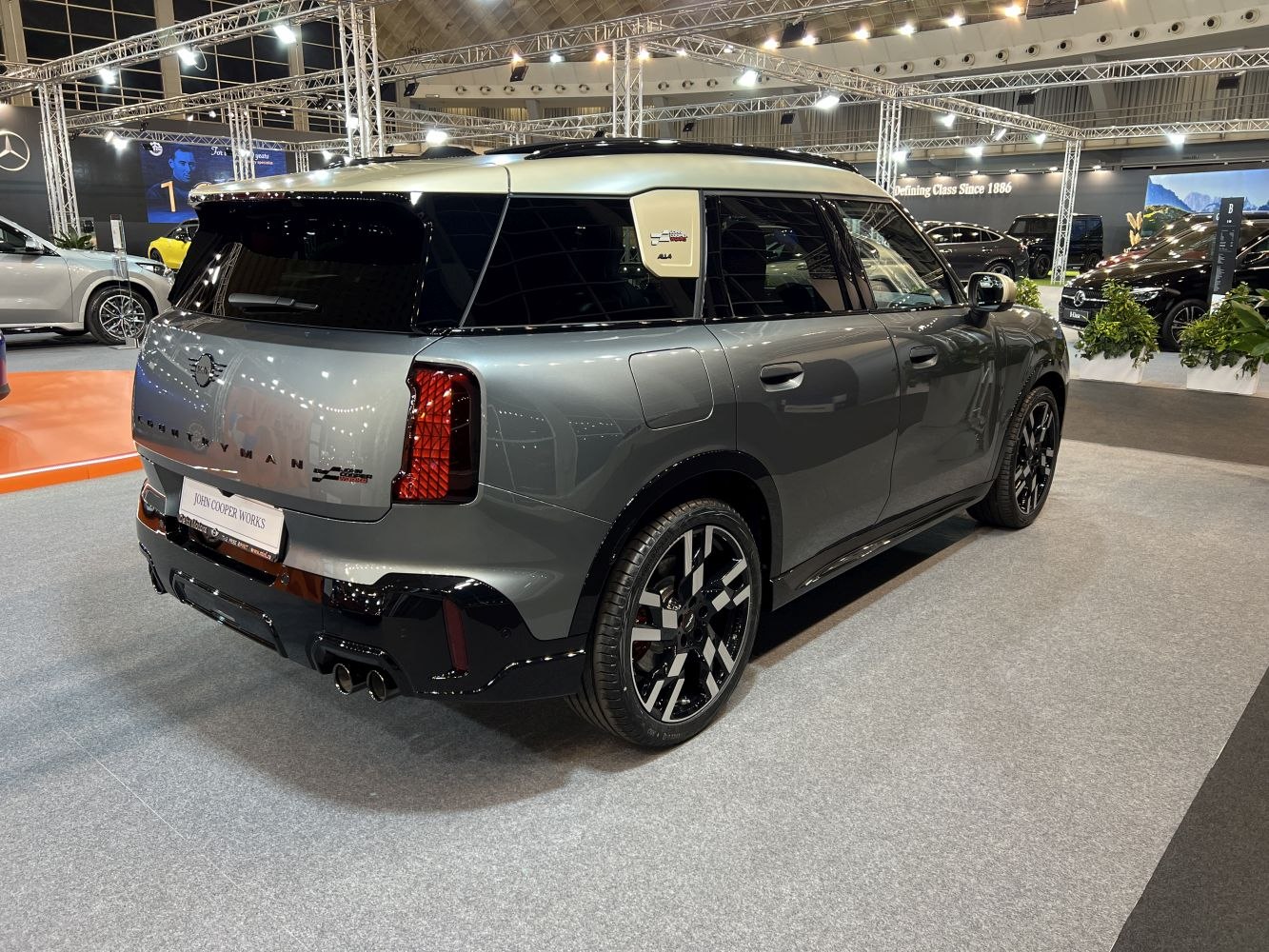 Rear and side view with sporty exhaust and distinctive design