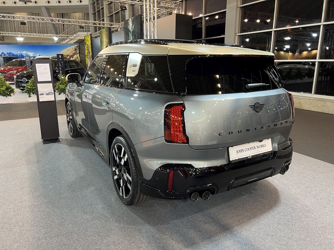 Rear view with dual exhaust and sleek tail lights of a modern compact SUV
