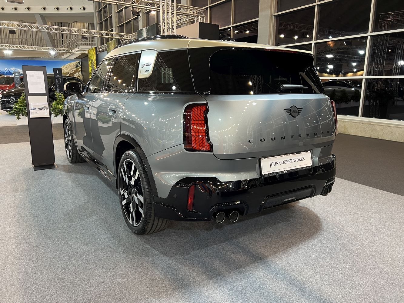 Rear and side view of a sporty compact SUV with distinctive dual exhausts and tinted windows