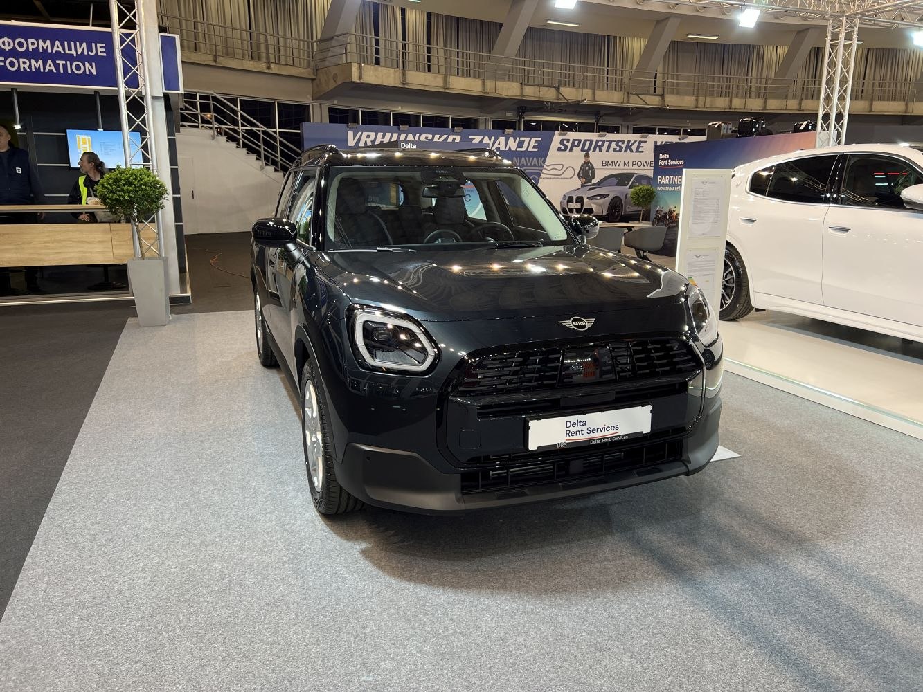 Front view of compact SUV with modern headlights and black grille