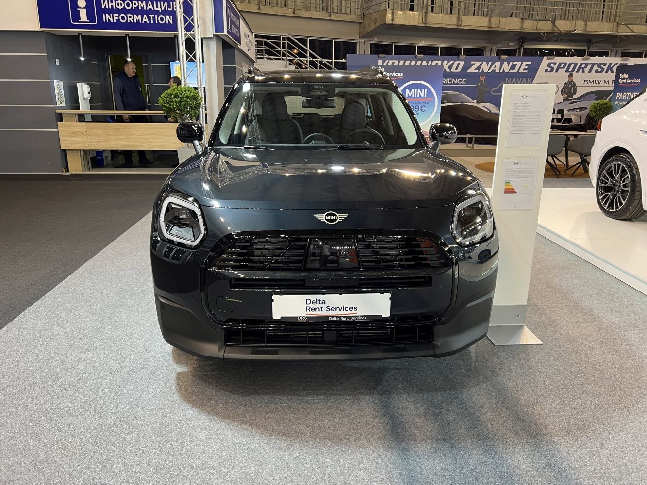 Front view of a compact SUV with sleek grille and modern headlights