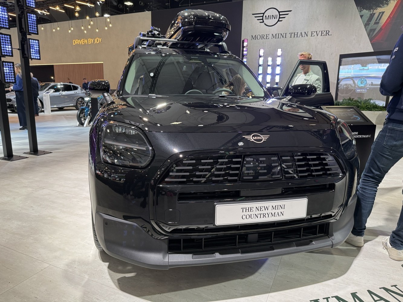 Front view of Mini Countryman with integrated grille, headlights, and roof box