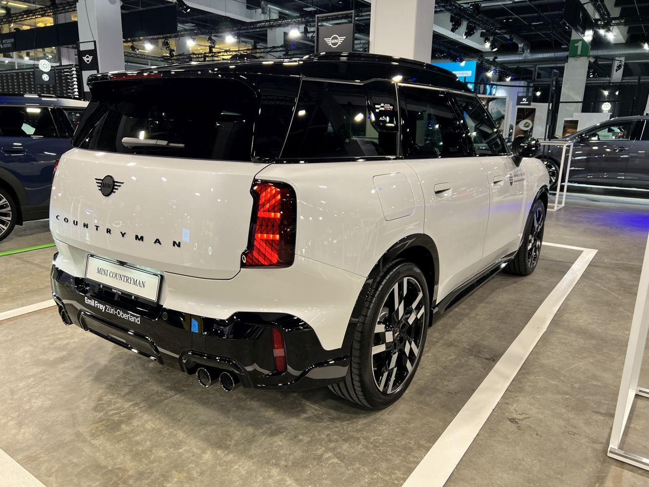 Rear view with LED taillights and dual exhaust in two-tone finish