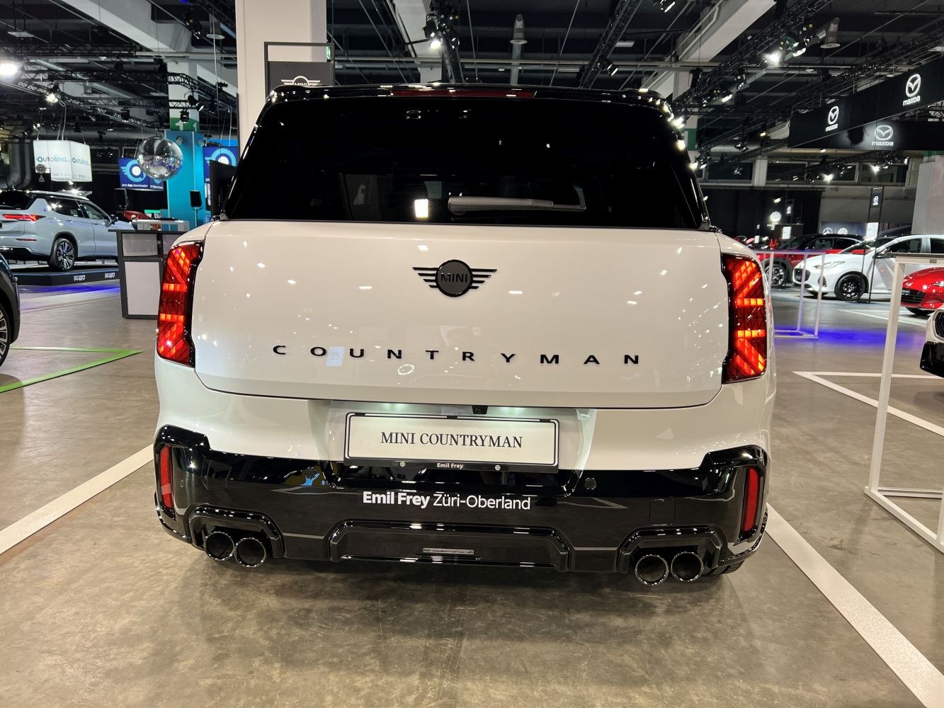 Rear view of SUV with quad exhaust and LED taillights