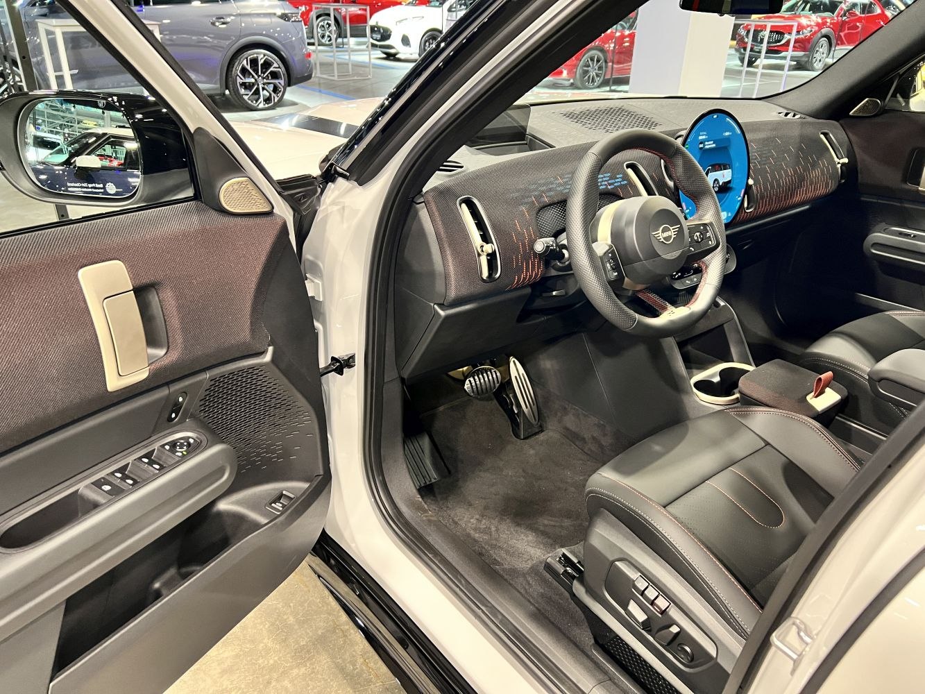 Modern car interior with digital dashboard and multifunction steering wheel
