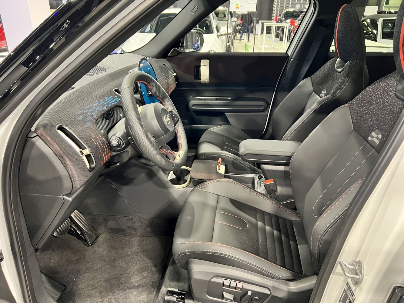 Modern dashboard and premium leather seating with detailed stitching