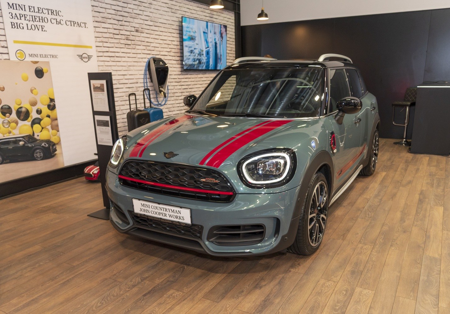 Sporty front view with LED headlights and red racing stripes.