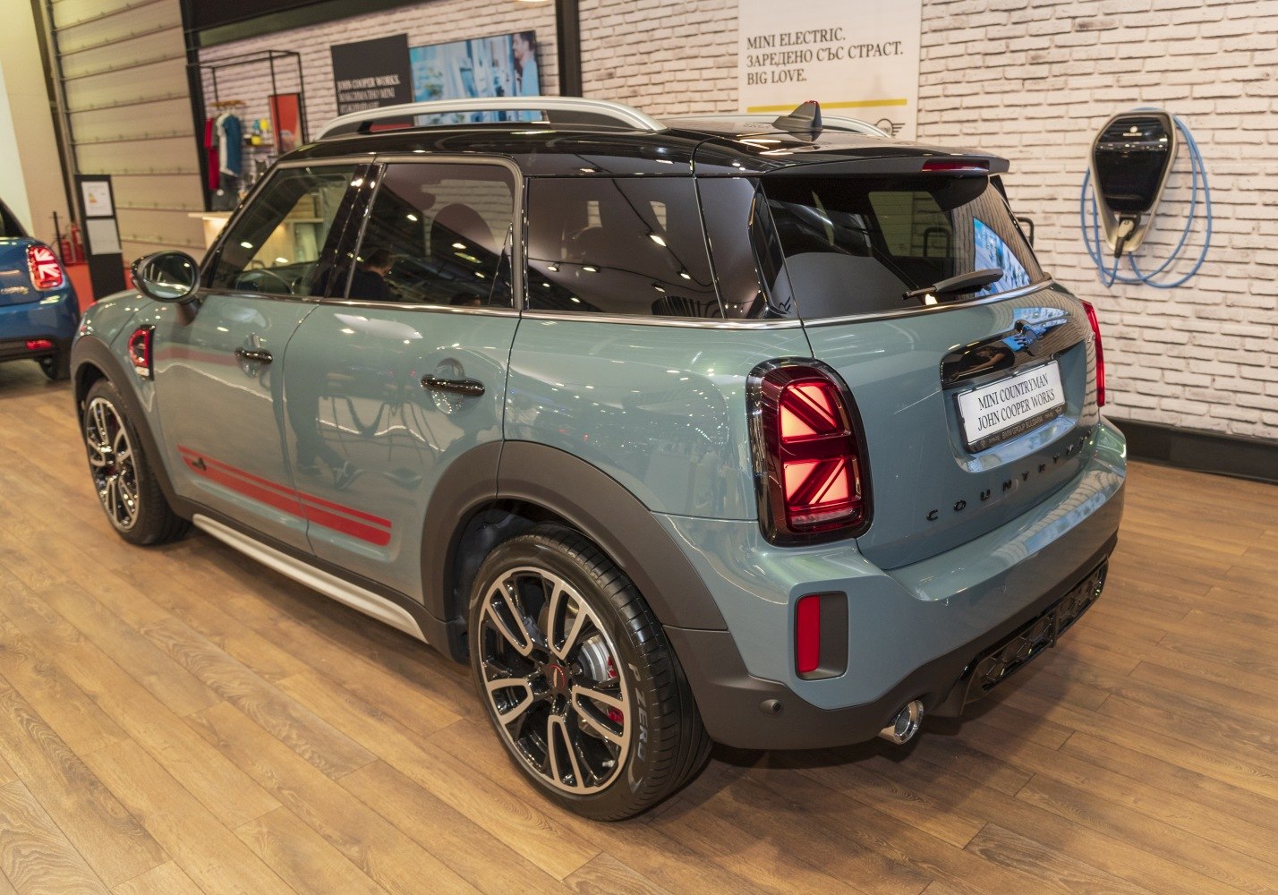 Rear and side view with distinctive taillights and sporty alloy wheels