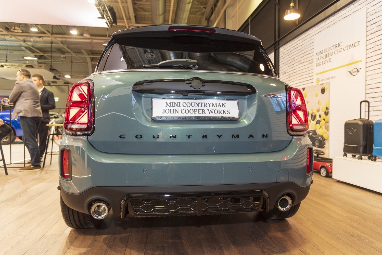 Rear view with signature taillights and dual exhausts of sporty compact SUV