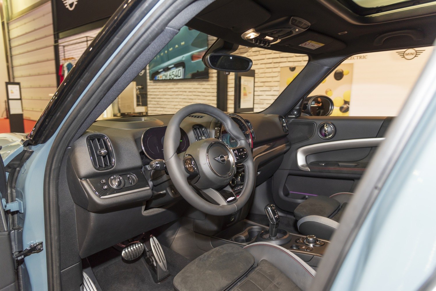 Modern interior cabin with steering wheel and dashboard controls