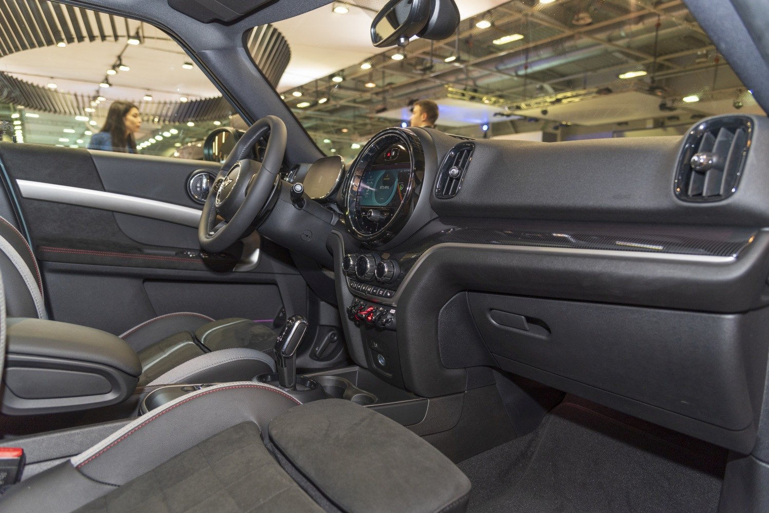 Modern interior dashboard and steering wheel with center console and gear shift