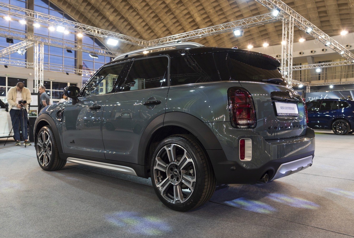 Rear three-quarter view with taillights and alloy wheels